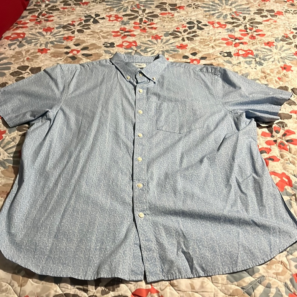 Brand new man’s short sleeve shirt color blue and white size 2xxl price 23.00